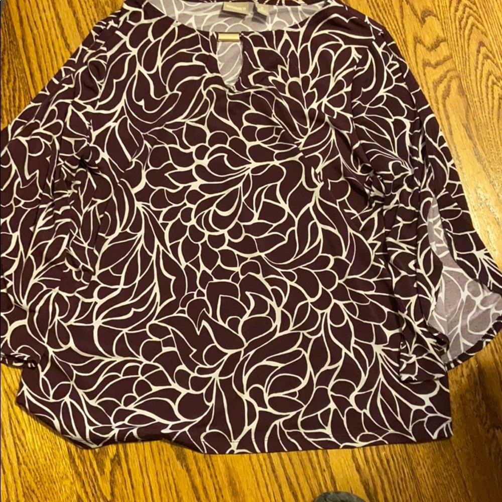 Top with peep hole sleeves